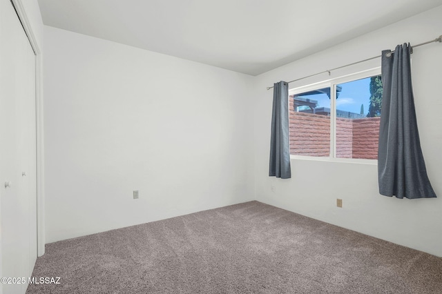 view of carpeted spare room