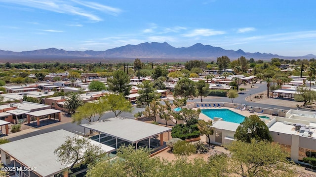 birds eye view of property featuring a mountain view