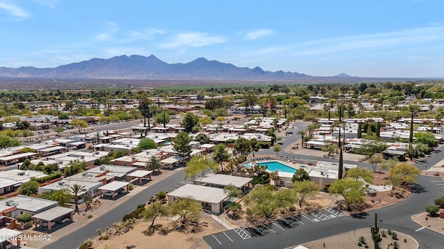 birds eye view of property with a residential view and a mountain view