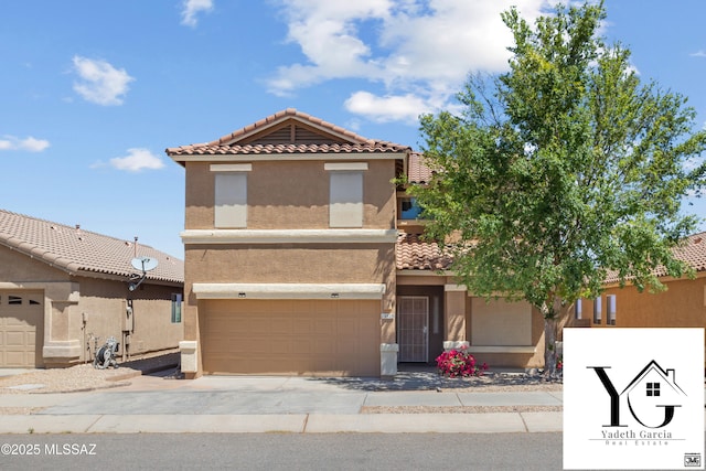 view of front of home with an attached garage, stucco siding, driveway, and a tile roof