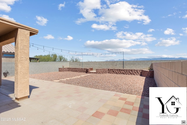 view of patio featuring a fenced backyard