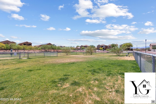 view of yard with fence