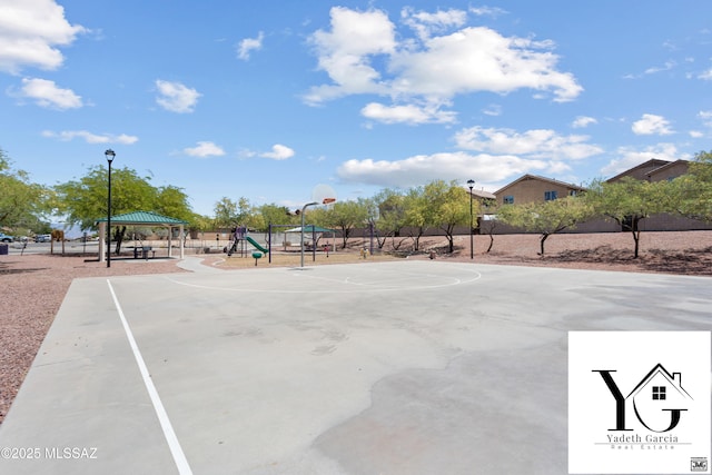 view of basketball court with a gazebo, fence, community basketball court, and playground community