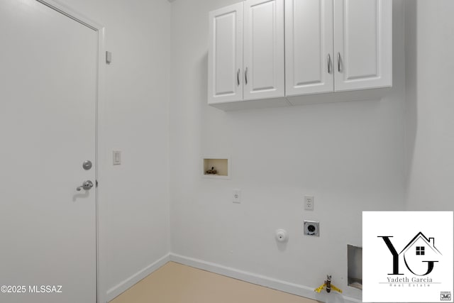 clothes washing area featuring gas dryer hookup, hookup for an electric dryer, cabinet space, baseboards, and hookup for a washing machine