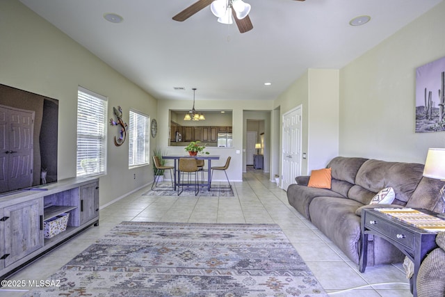 33925 S Alvarado St, Red Rock, AZ 85145 - living room featuring a ceiling fan, baseboards, recessed lighting, light tile patterned floors, and visible vents