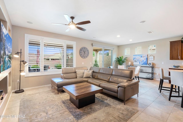 7084 W Cliff Spring Trl, Marana, AZ 85658 - living area featuring a ceiling fan, light tile patterned flooring, baseboards, and recessed lighting