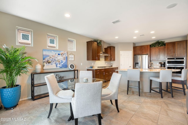 7084 W Cliff Spring Trl, Marana, AZ 85658 - dining room featuring recessed lighting and light tile patterned floors