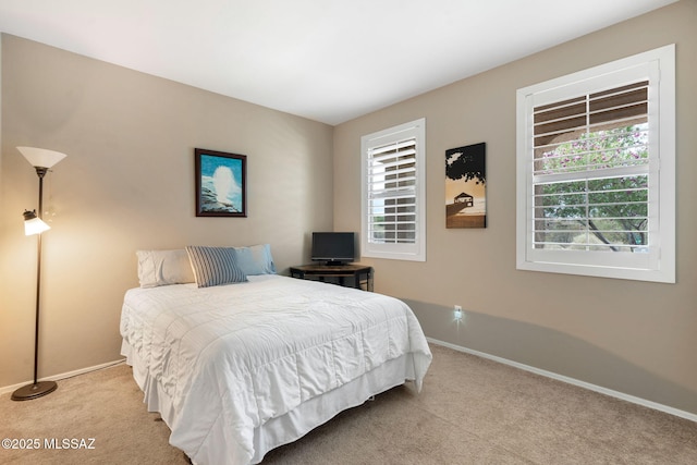 7084 W Cliff Spring Trl, Marana, AZ 85658 - bedroom featuring carpet flooring and baseboards