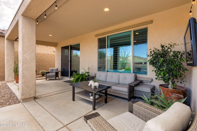 7084 W Cliff Spring Trl, Marana, AZ 85658 - view of patio / terrace featuring outdoor lounge area