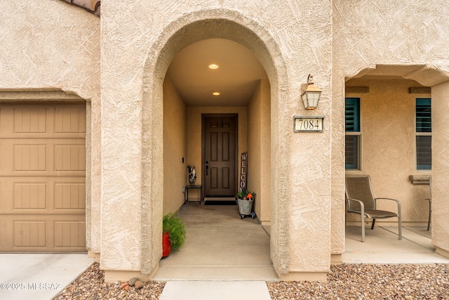 7084 W Cliff Spring Trl, Marana, AZ 85658 - entrance to property featuring stucco siding