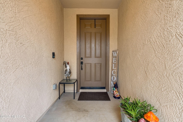 7084 W Cliff Spring Trl, Marana, AZ 85658 - view of exterior entry with stucco siding