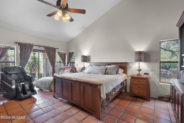 bedroom featuring a ceiling fan, access to exterior, light tile patterned floors, high vaulted ceiling, and a textured wall