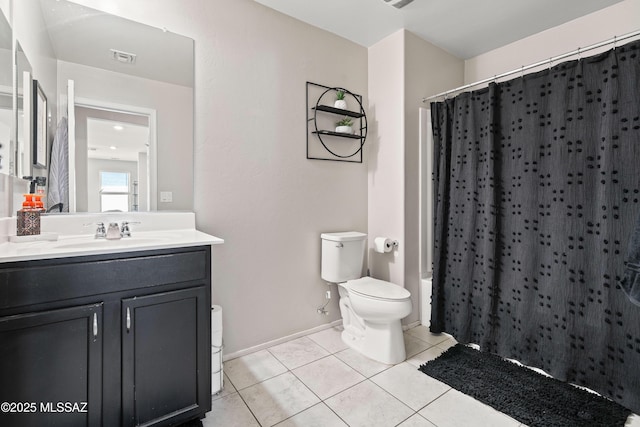 full bathroom with visible vents, vanity, tile patterned floors, toilet, and shower / tub combo with curtain