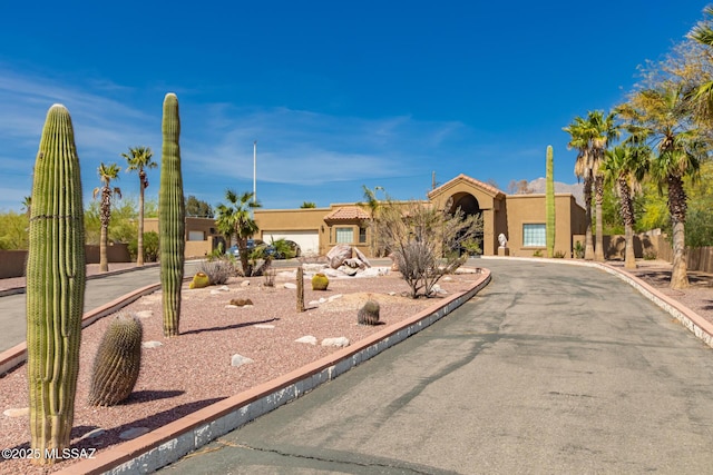1330 W Panorama Rd, Tucson, AZ 85704 - southwest-style home with a tile roof and stucco siding