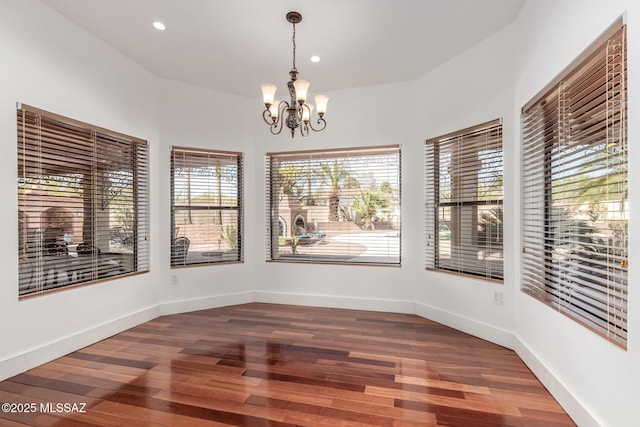1330 W Panorama Rd, Tucson, AZ 85704 - unfurnished dining area featuring recessed lighting, a notable chandelier, and wood finished floors