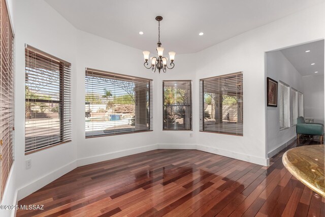 1330 W Panorama Rd, Tucson, AZ 85704 - unfurnished dining area with recessed lighting, dark wood-style flooring, baseboards, and a chandelier