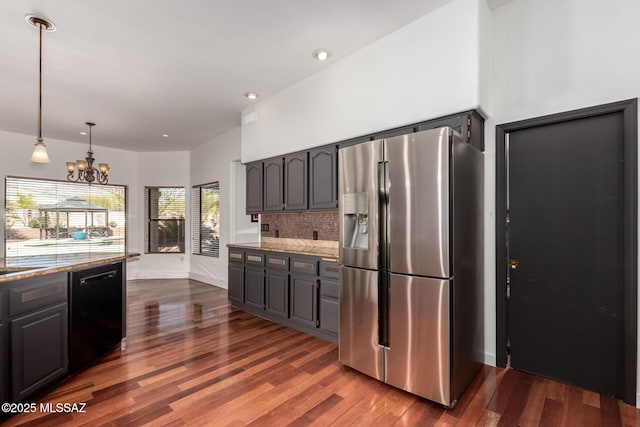1330 W Panorama Rd, Tucson, AZ 85704 - kitchen with stainless steel fridge with ice dispenser, dark wood-type flooring, a chandelier, and dishwasher