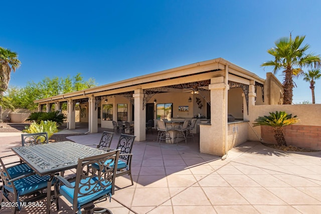 1330 W Panorama Rd, Tucson, AZ 85704 - view of patio featuring fence, outdoor dining space, and area for grilling