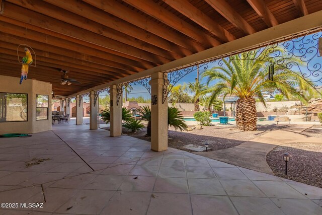 1330 W Panorama Rd, Tucson, AZ 85704 - view of patio / terrace featuring a fenced in pool, a ceiling fan, outdoor dining area, and a fenced backyard
