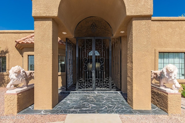 1330 W Panorama Rd, Tucson, AZ 85704 - entrance to property featuring a gate and stucco siding