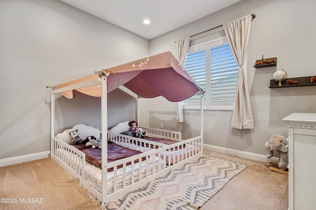 bedroom with carpet floors, recessed lighting, and baseboards