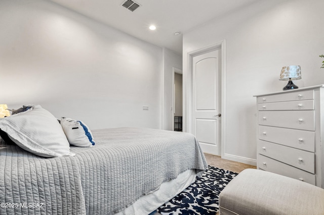 bedroom with recessed lighting, baseboards, and visible vents