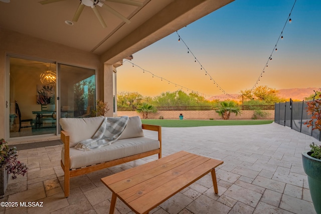 view of patio / terrace featuring a fenced backyard and ceiling fan