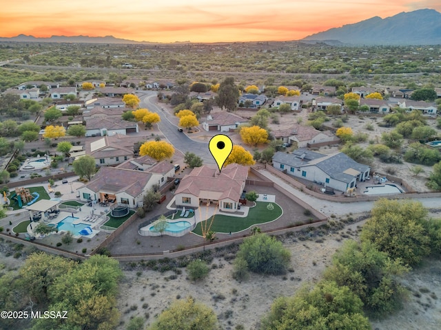 birds eye view of property featuring a residential view and a mountain view