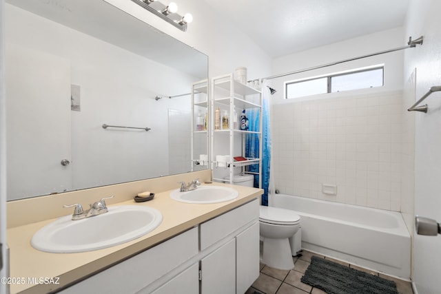 bathroom featuring tile patterned flooring, a sink, shower / bathtub combination with curtain, and double vanity