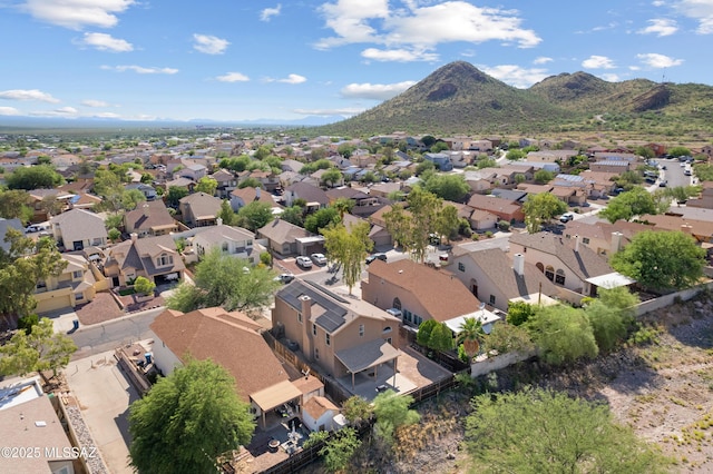 birds eye view of property with a residential view and a mountain view