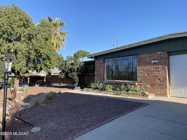 view of property exterior with brick siding