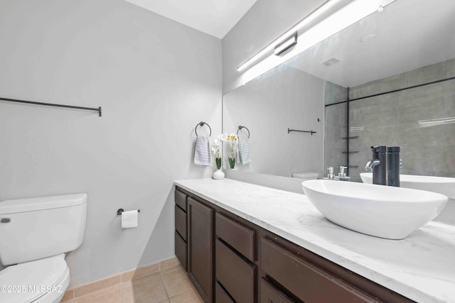 5675 N Camino Esplendora Unit 1103, Tucson, AZ 85718 - full bath featuring toilet, tile patterned flooring, vanity, and a tile shower