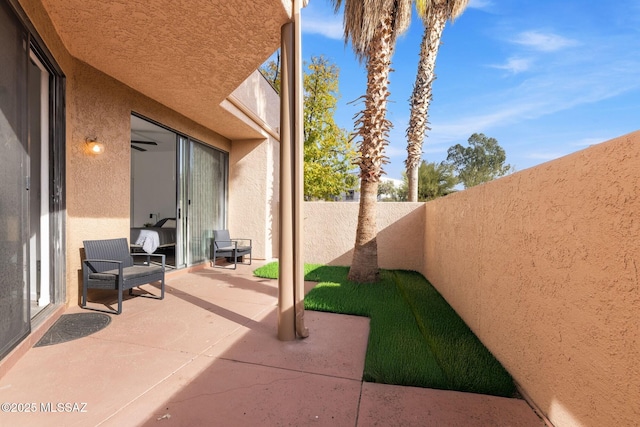 5675 N Camino Esplendora Unit 1103, Tucson, AZ 85718 - view of patio featuring a fenced backyard