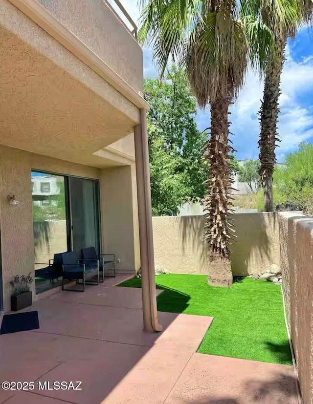 5675 N Camino Esplendora Unit 1103, Tucson, AZ 85718 - view of patio / terrace