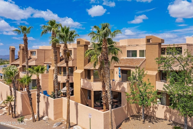5675 N Camino Esplendora Unit 1103, Tucson, AZ 85718 - view of property featuring fence