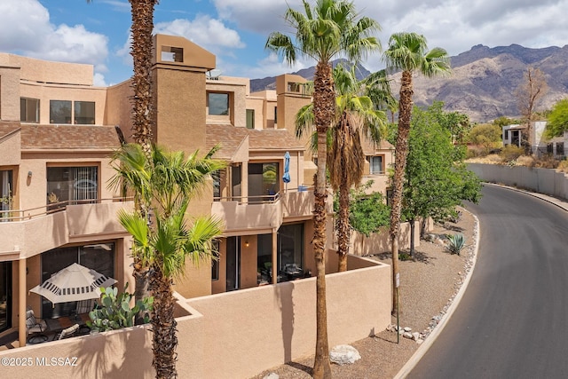 5675 N Camino Esplendora Unit 1103, Tucson, AZ 85718 - view of building exterior with a mountain view