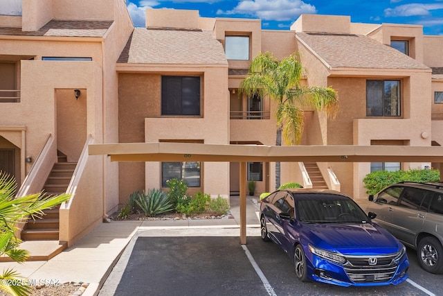 5675 N Camino Esplendora Unit 1103, Tucson, AZ 85718 - covered parking lot with stairs