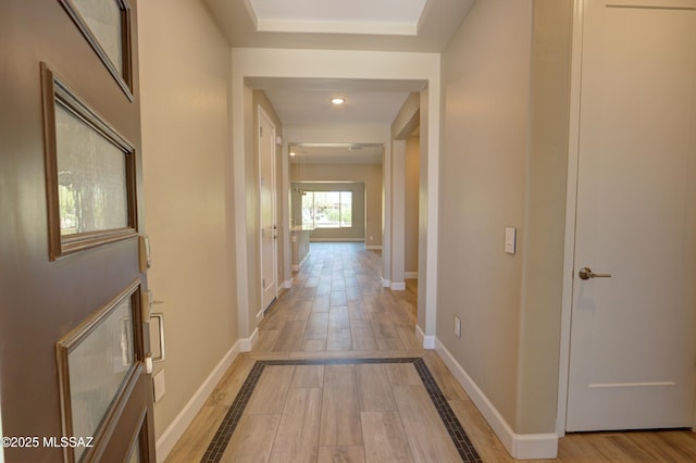 62908 E Thunder Rock Dr, Tucson, AZ 85739 - corridor featuring baseboards and light wood finished floors