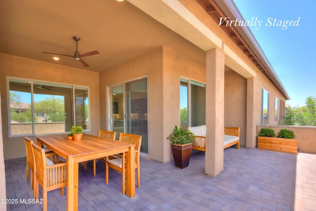 62908 E Thunder Rock Dr, Tucson, AZ 85739 - view of patio with outdoor dining area and ceiling fan