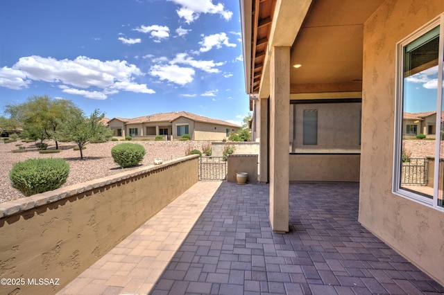 62908 E Thunder Rock Dr, Tucson, AZ 85739 - view of patio / terrace with a gate and fence