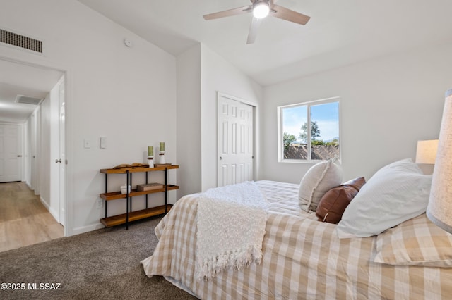 9453 E Pena Dr, Tucson, AZ 85730 - carpeted bedroom featuring ceiling fan, visible vents, vaulted ceiling, and a closet