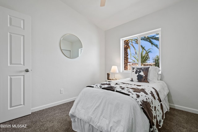 9453 E Pena Dr, Tucson, AZ 85730 - carpeted bedroom with baseboards, ceiling fan, and lofted ceiling