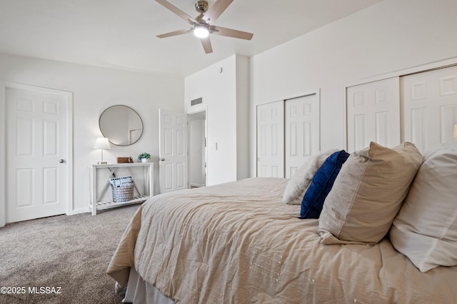 9453 E Pena Dr, Tucson, AZ 85730 - bedroom featuring visible vents, multiple closets, baseboards, ceiling fan, and carpet flooring