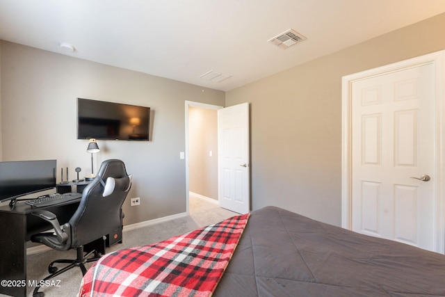 carpeted bedroom with baseboards and visible vents