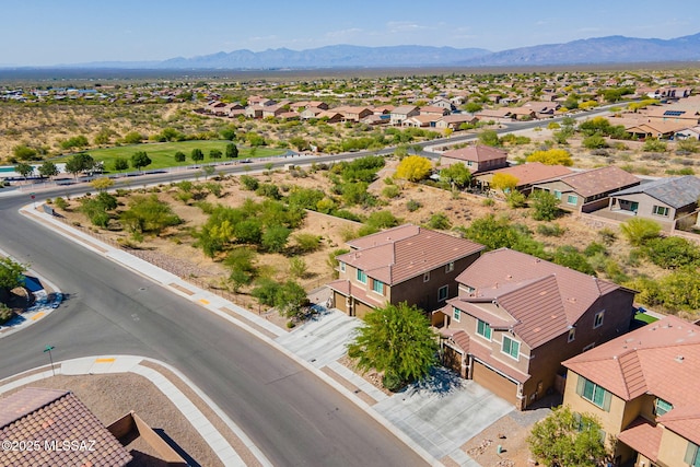 drone / aerial view with a mountain view and a residential view