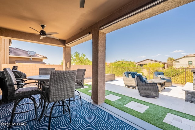 view of patio with outdoor lounge area, outdoor dining area, a fenced backyard, and ceiling fan
