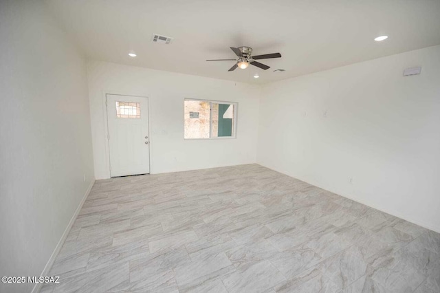 spare room with a ceiling fan, recessed lighting, and visible vents