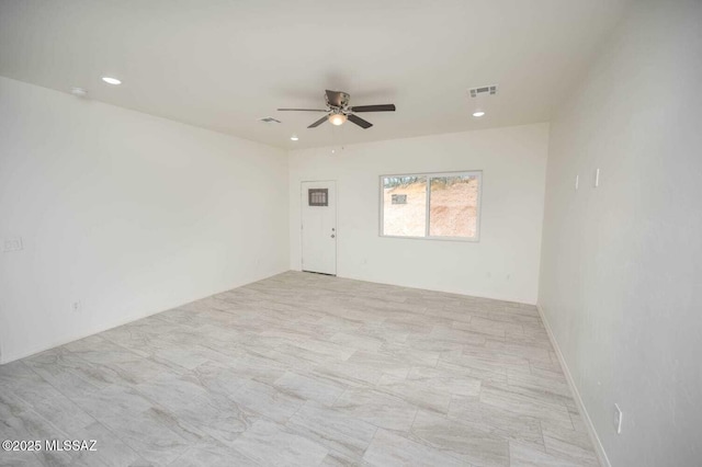 spare room featuring a ceiling fan, visible vents, and recessed lighting