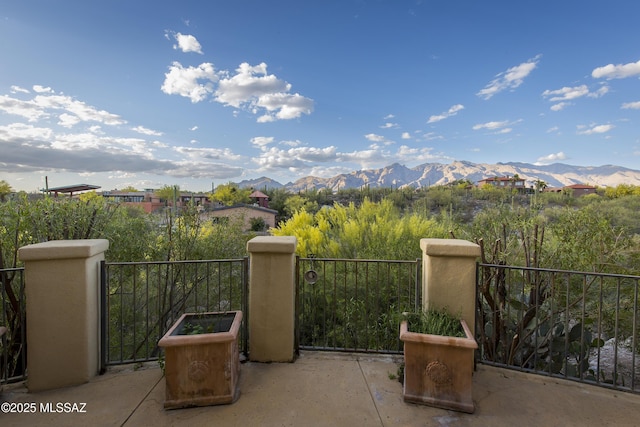 4519 N Camino Kino, Tucson, AZ 85718 - view of patio / terrace with a balcony and a mountain view