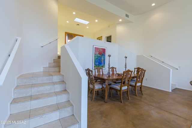 4519 N Camino Kino, Tucson, AZ 85718 - staircase with recessed lighting, baseboards, and finished concrete floors